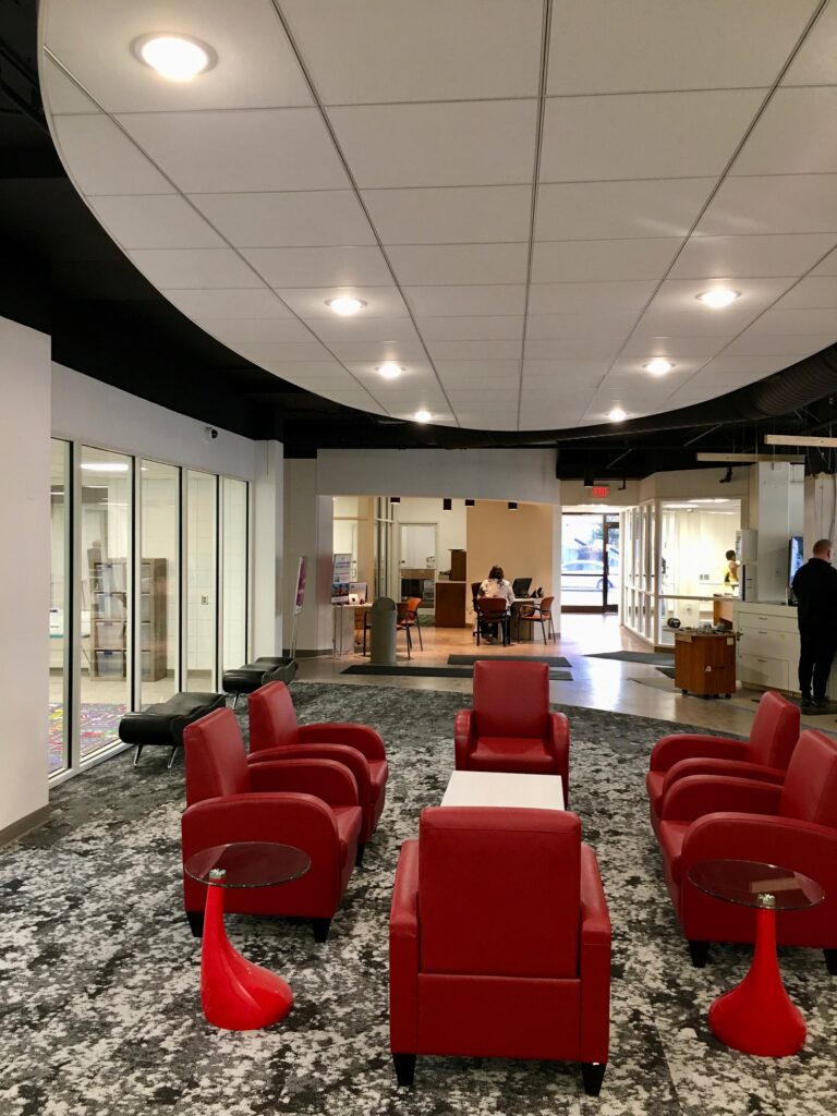 Red Chairs and Table at the Downtown Louisville YMCA Lobby